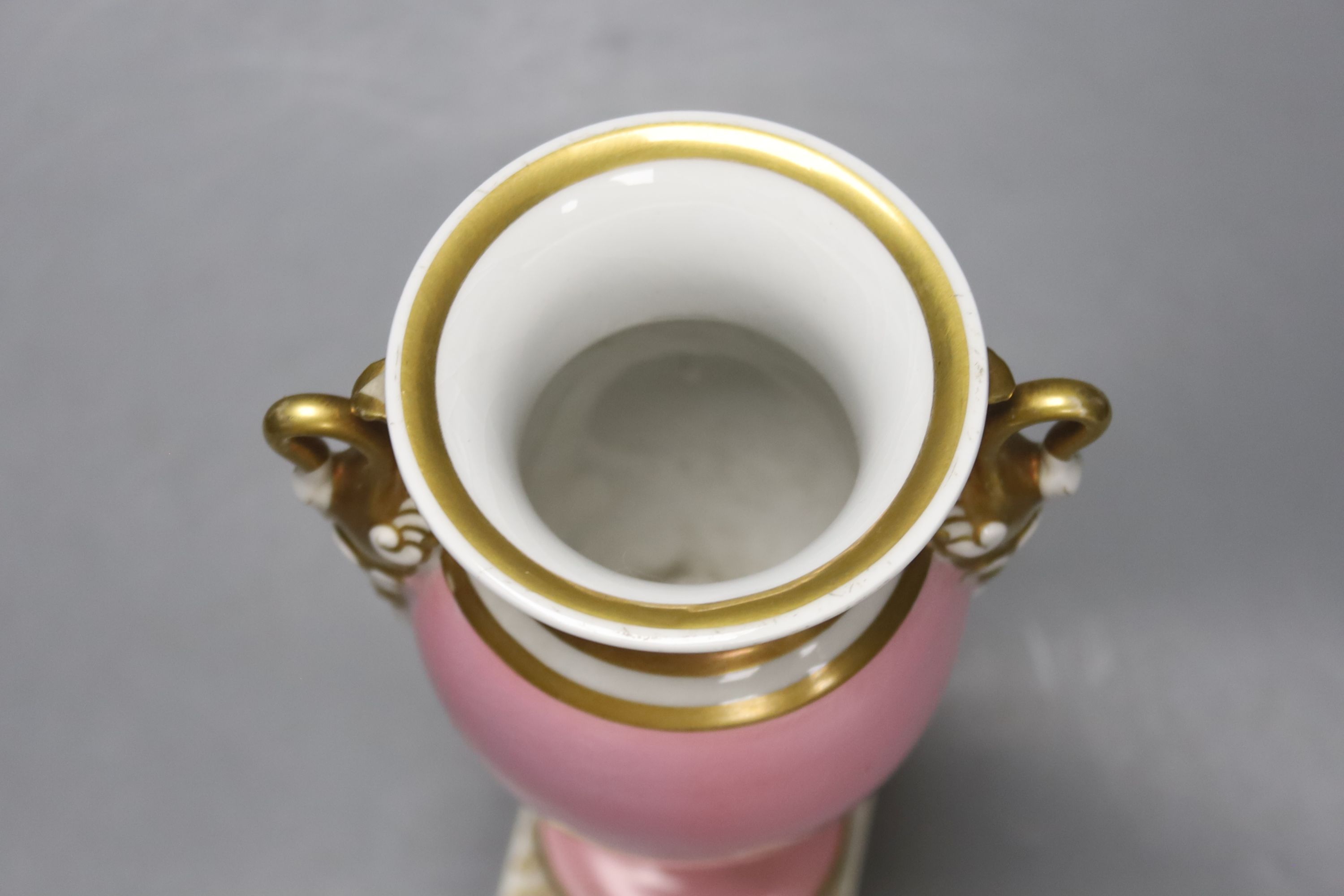 A Chamberlains Worcester pink ground vase, with swan neck handles, Chamberlains script mark to base, height 23cm